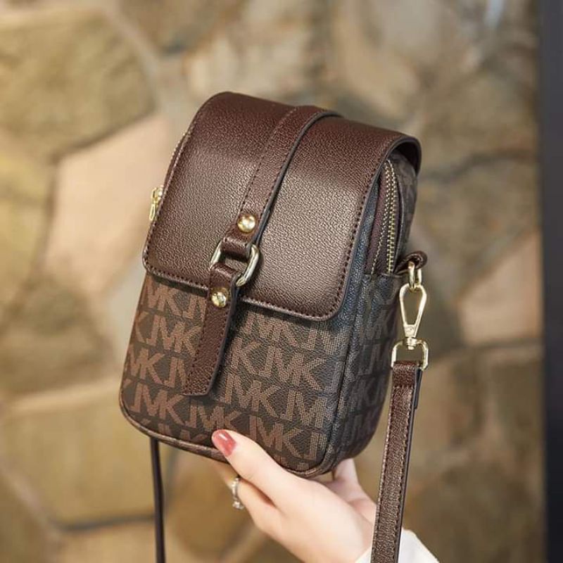 Mk sling online bag