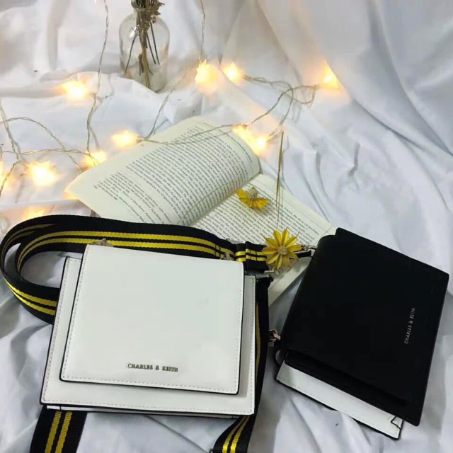 Black and discount white sling bag