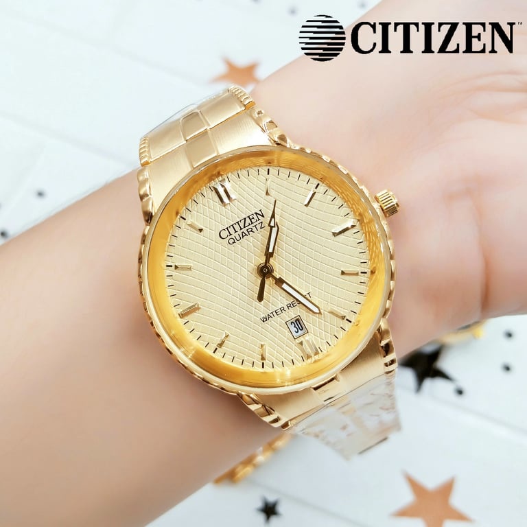 Citizen Quartz Gold Dial Women's Elegant watch with date Stainless