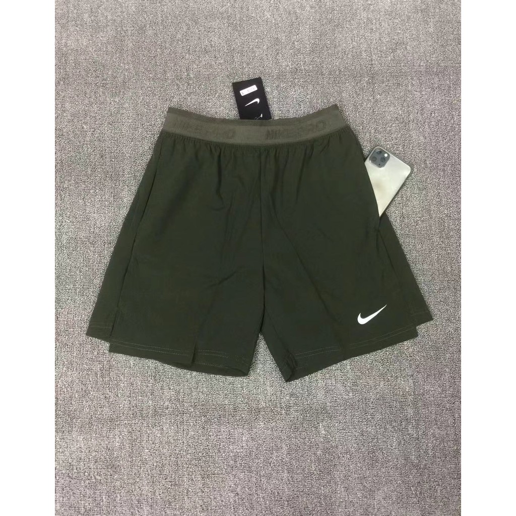 Dark green hot sale nike shorts