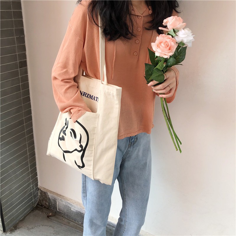 Girl with hotsell tote bag