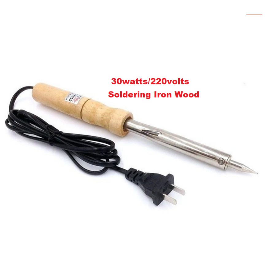 Soldering iron online on wood