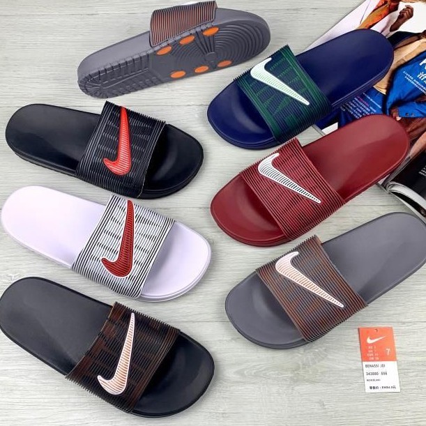 Nike hotsell slippers latest