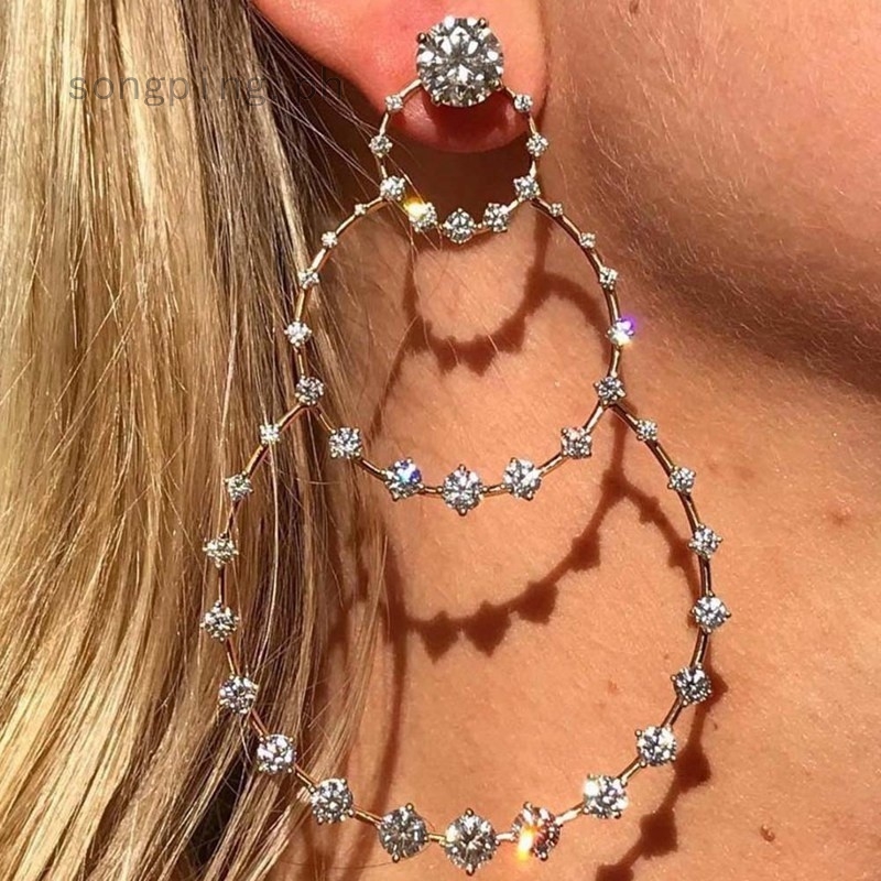 Big dangle diamond earrings shop