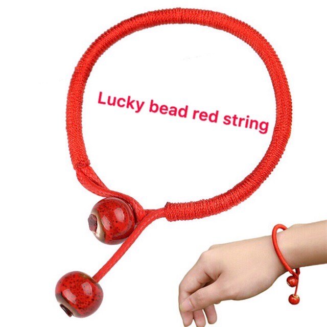 Lucky bead deals red string