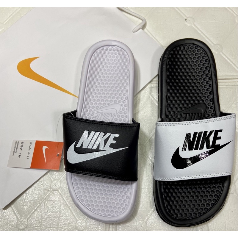 Half black half white nike slides online