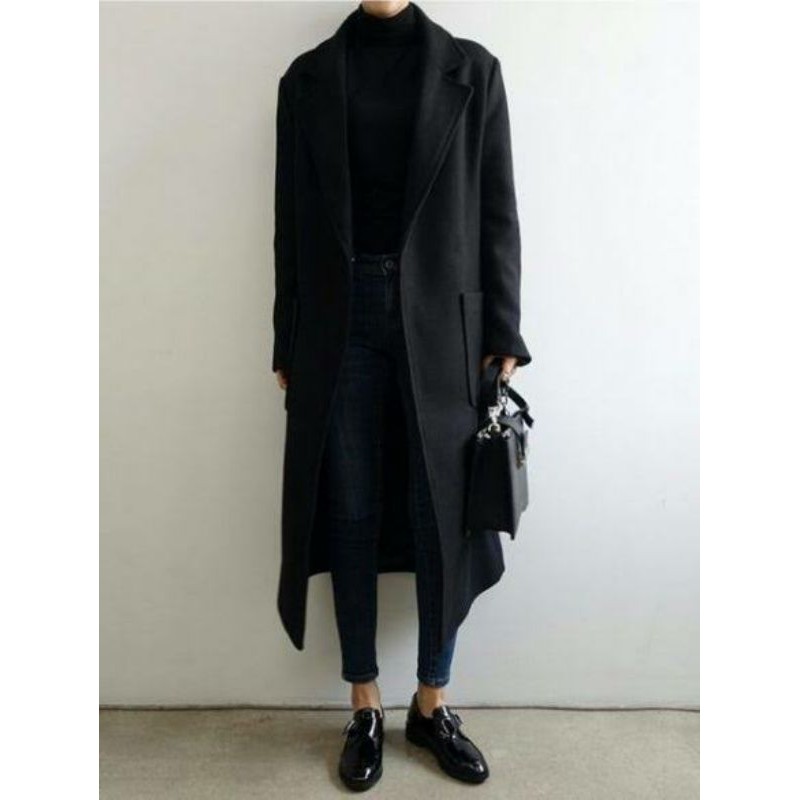 Black turtleneck with clearance coat