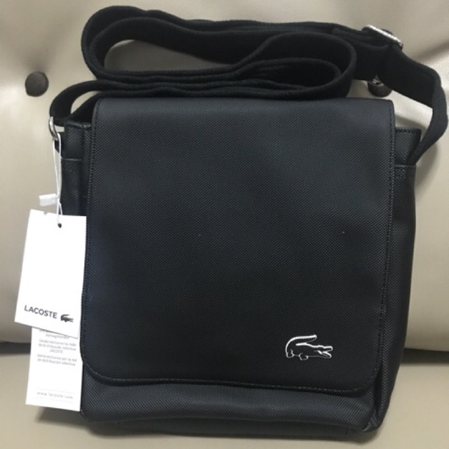 Lacoste sling cheap bag original price