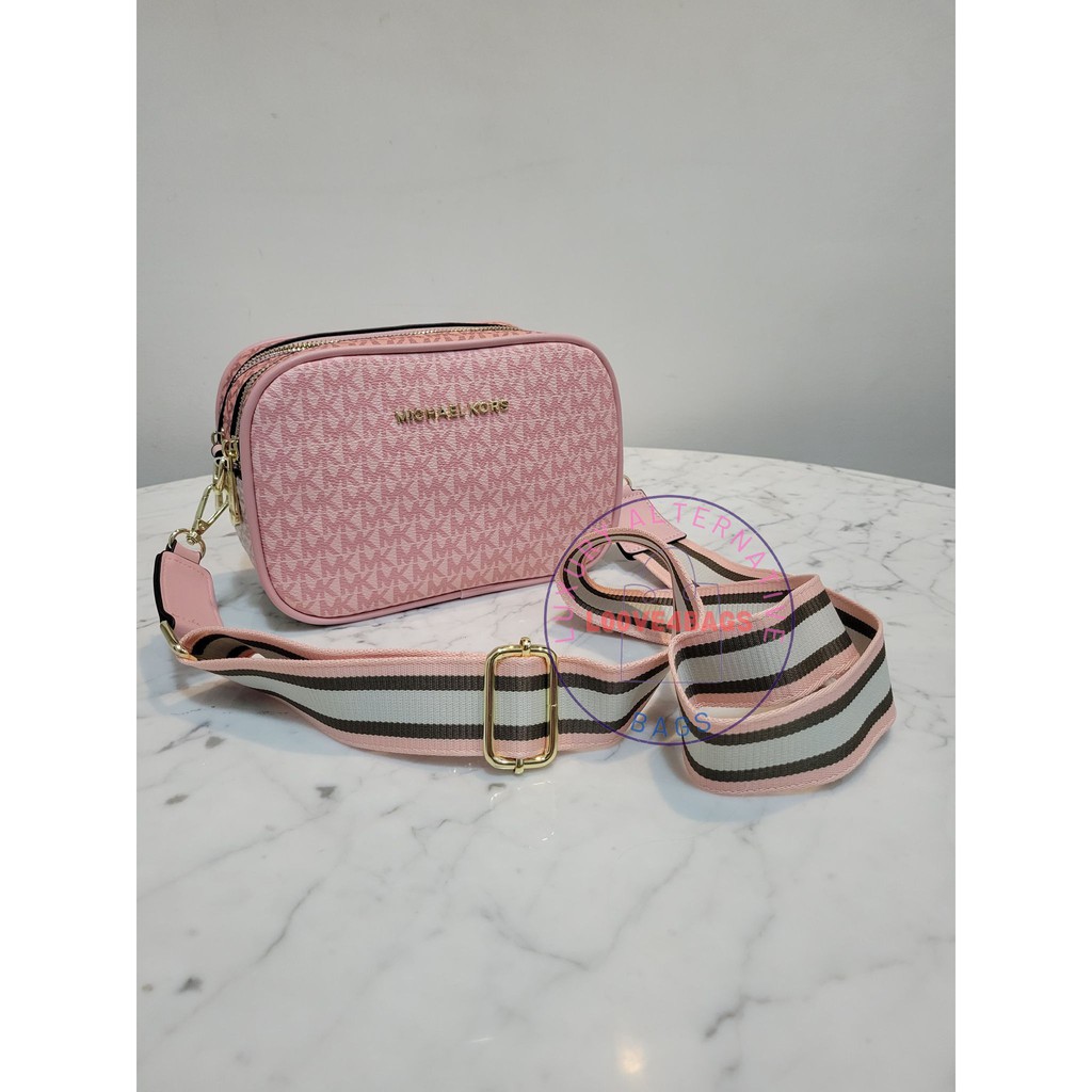 Mk pink sling online bag