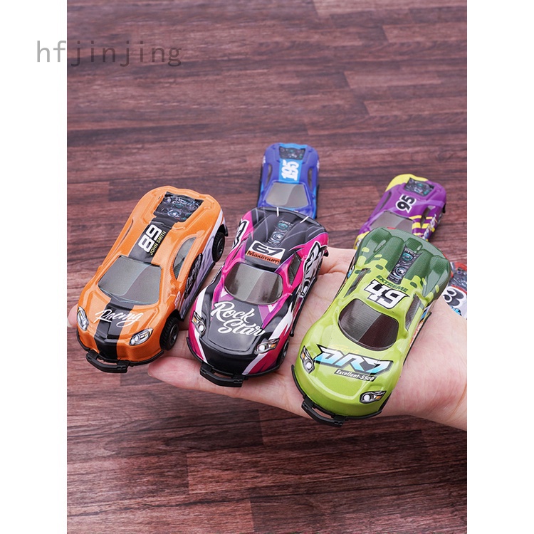 Juiced HOT + Stunt Toy Car, Jump Stunt 360 Rotating Pull Back Vehicles Alloy Catapult Mini