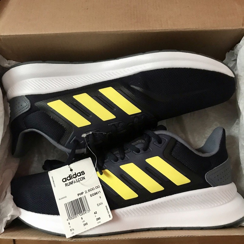 Adidas shoes with store price tag