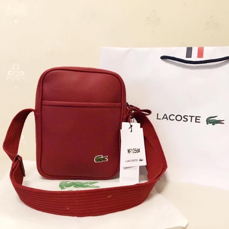 Lacoste red best sale sling bag