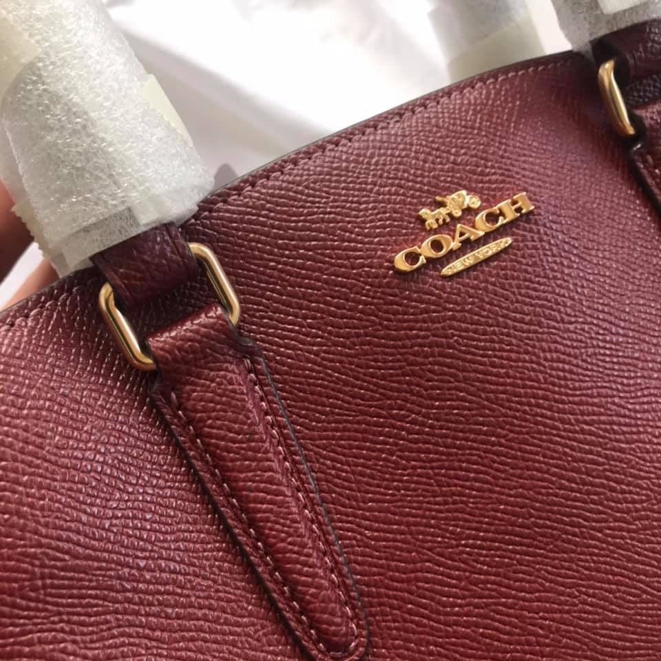 Maroon coach discount purse