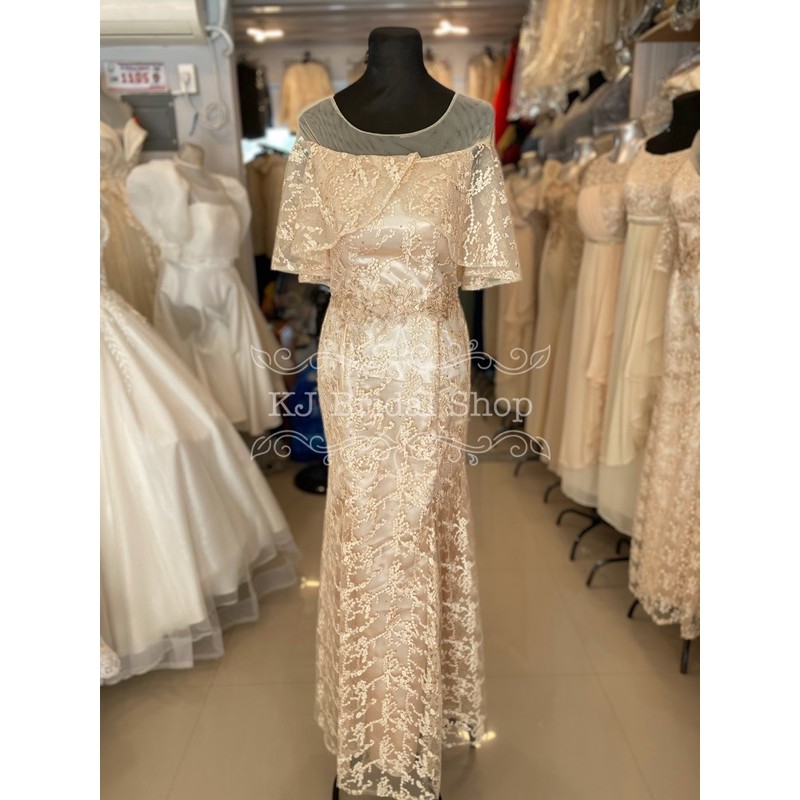 Champagne color gown for principal outlet sponsors