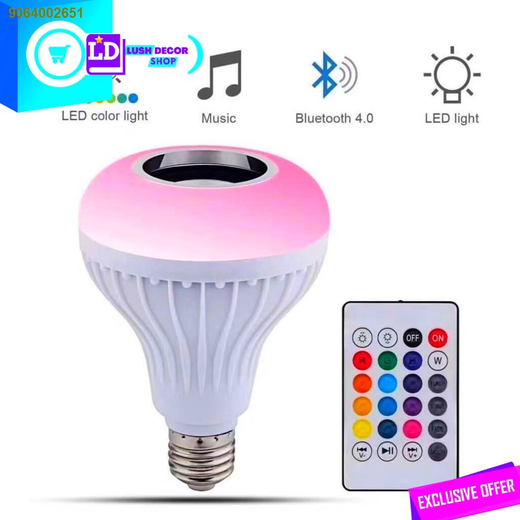 Color changing light bulb with clearance speaker