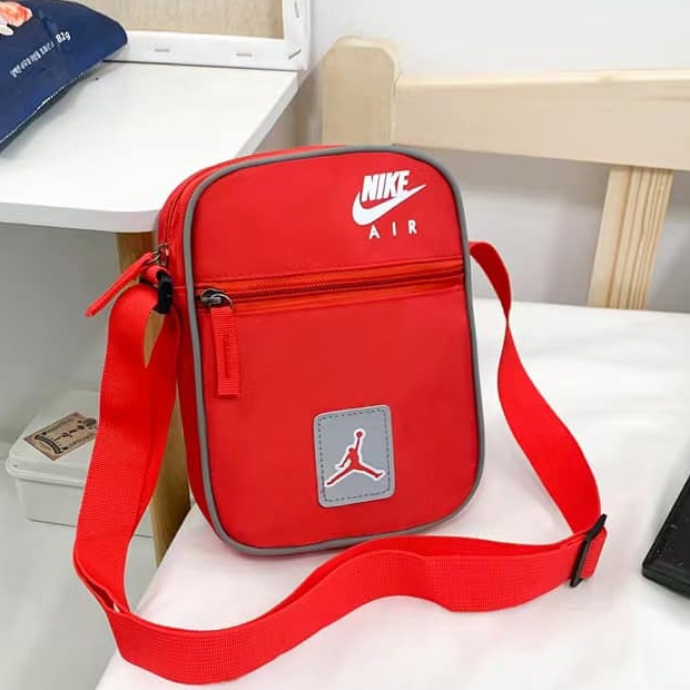 Jordan sling bag online red