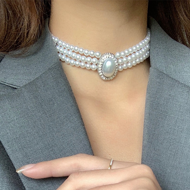 Pearl necklace deals choker with planet