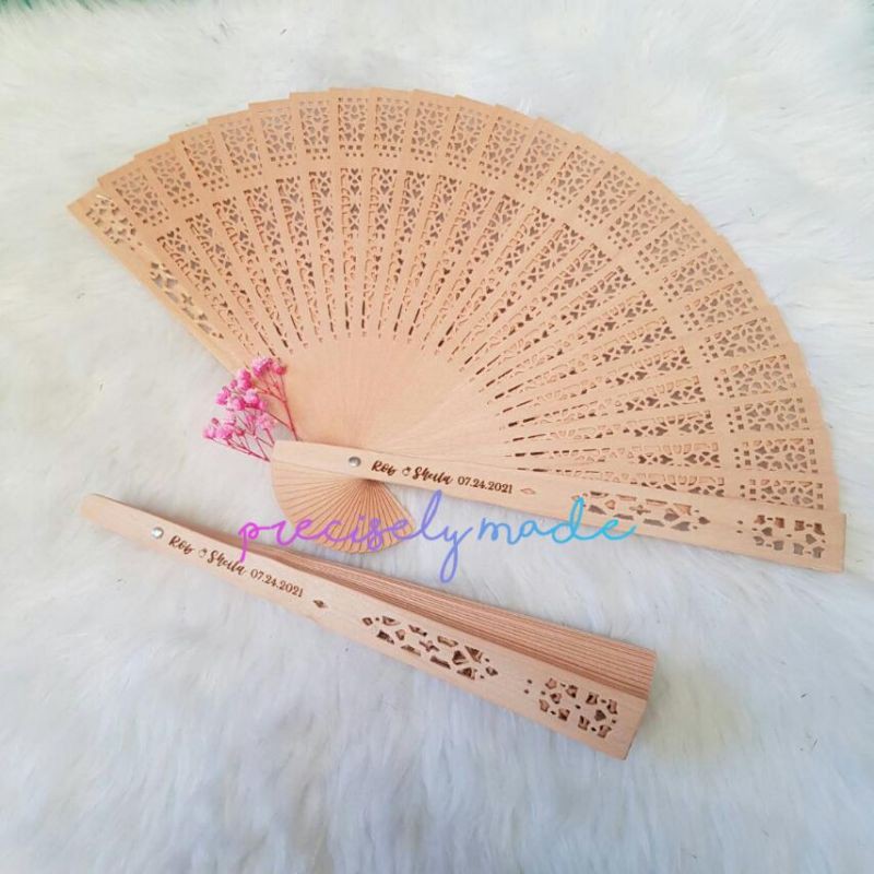 Engraved on sale sandalwood fans