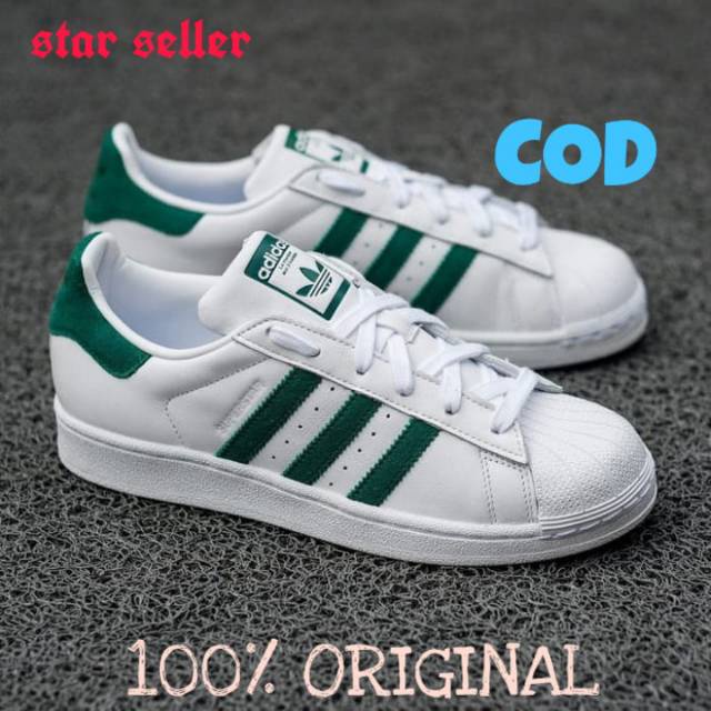 Adidas superstar store white green stripes