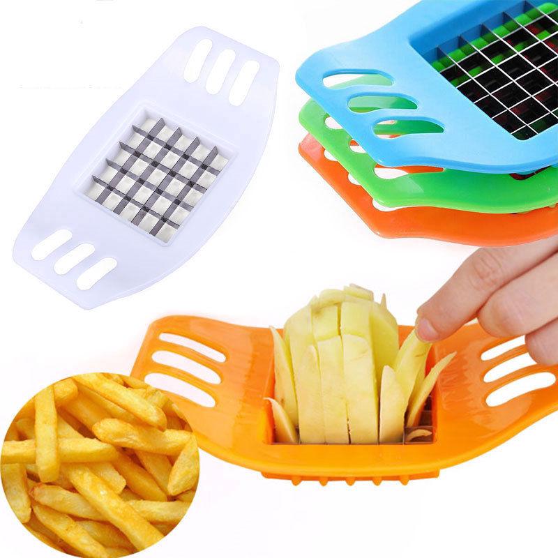 Image of Potato slices are being cut using chips slicer to prepare potato  chips-KM389851-Picxy