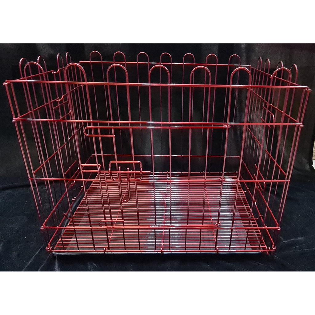 Dog cage with outlet poop tray