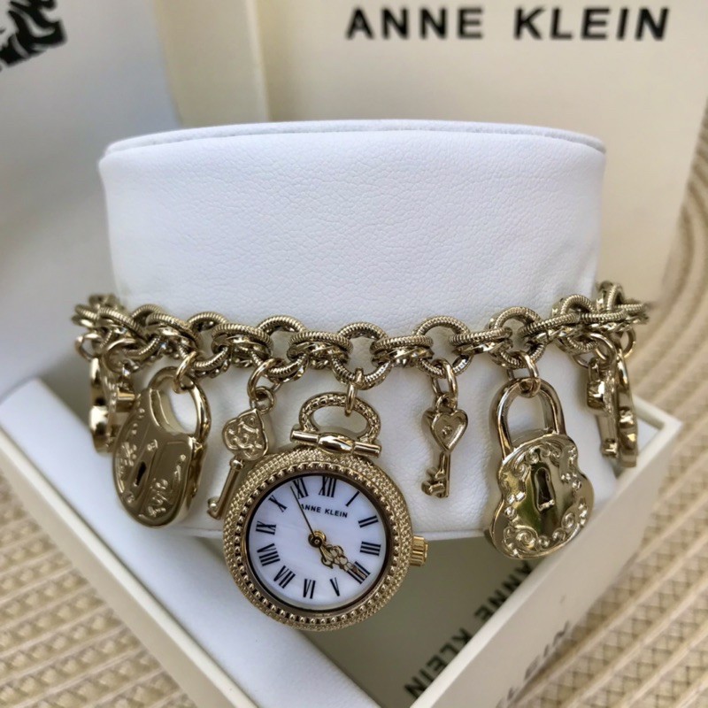 Anne klein charm hot sale bracelet watch