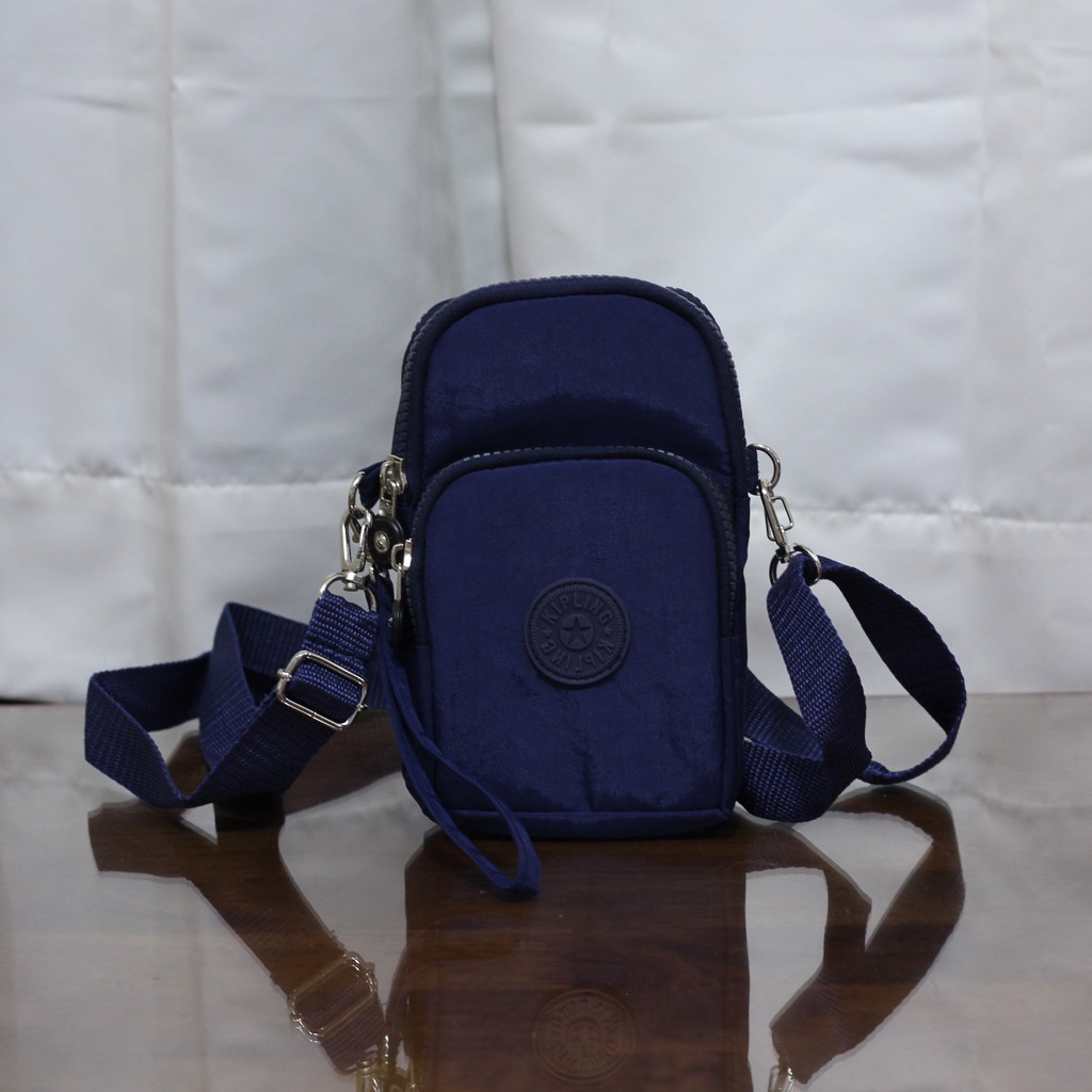 Kipling mini sling discount bag