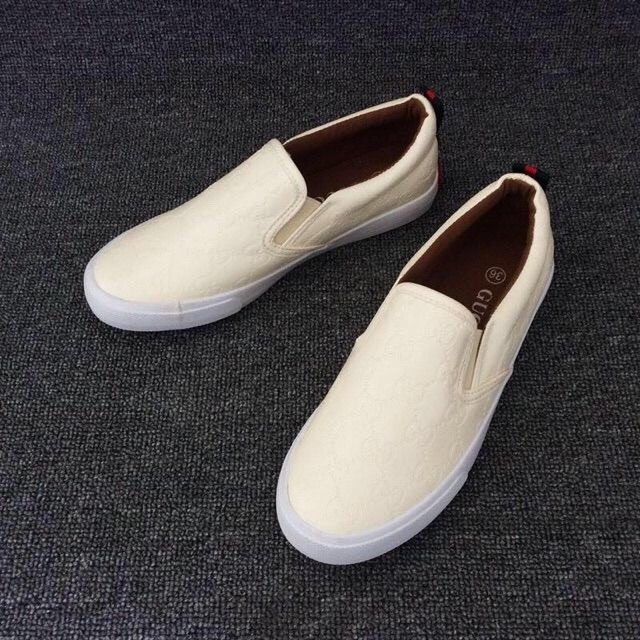 Gucci white store slip ons