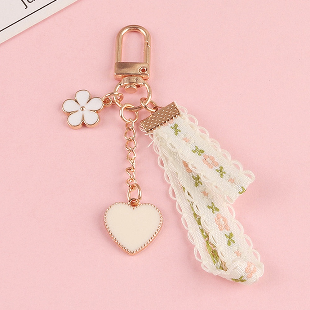 ins-small-daisy-flower-keychain-for-women-bell-ribbon-key-ring-bag