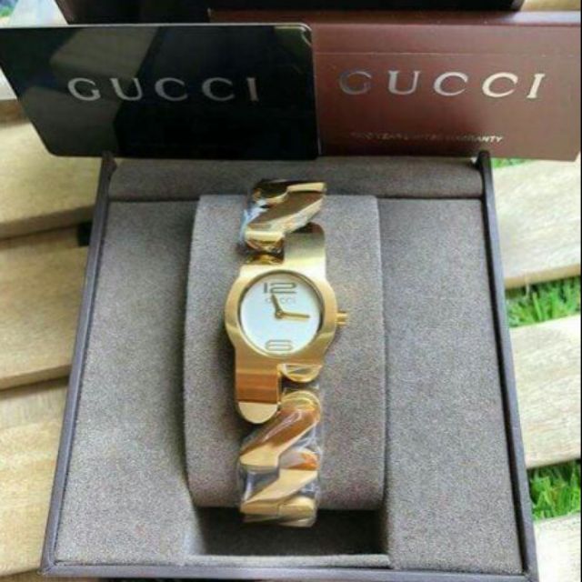 Gucci zig zag discount gold watch price