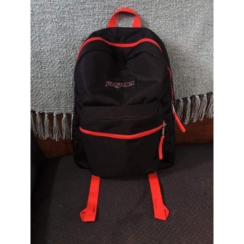 jansport backpack over expose black orange details