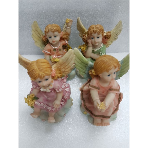 3.5 inches poly angel sitting on cloud with flowers | Shopee Philippines