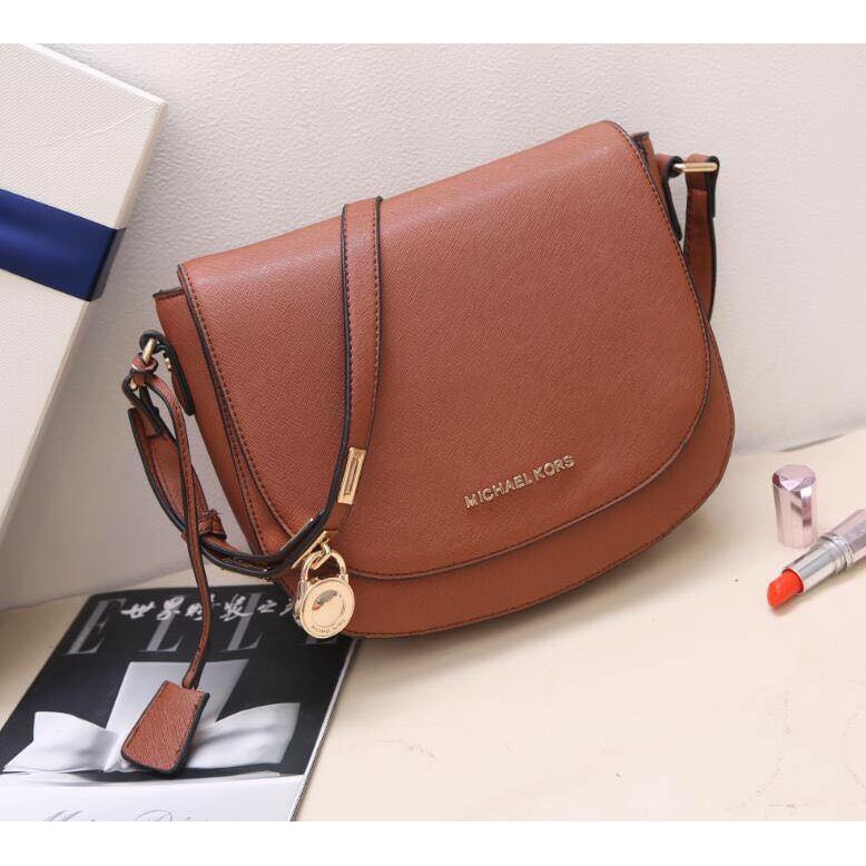 Mk brown store sling bag