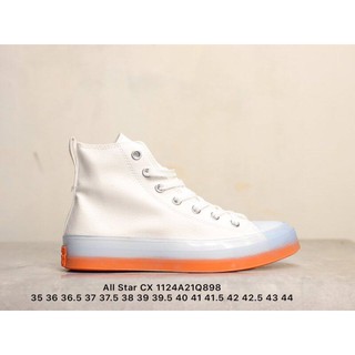 Converse with store orange bottom