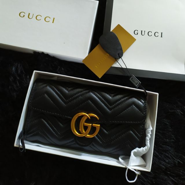 Gucci sling store wallet bag