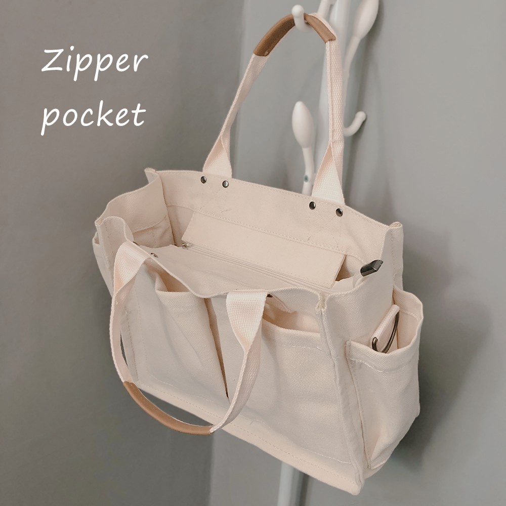 Canvas tote with outside pockets best sale