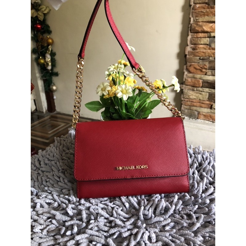 Mk sling best sale bag red