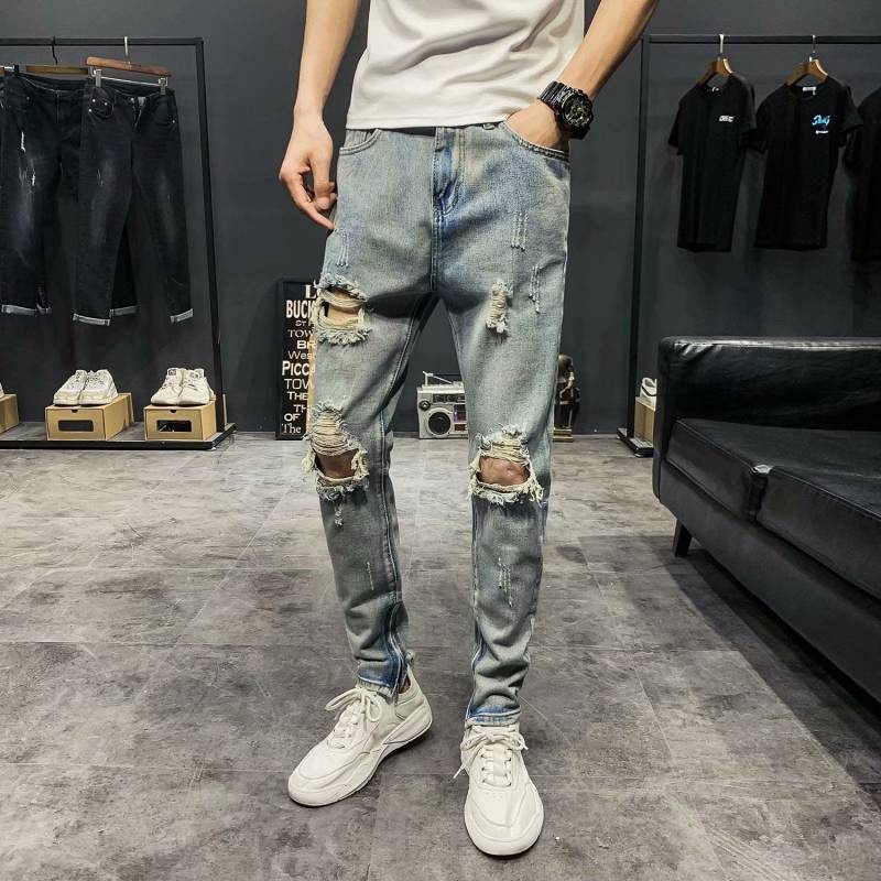 Light colored best sale ripped jeans mens