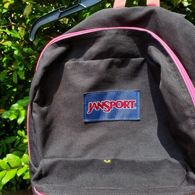 Black and pink jansport cheap backpack