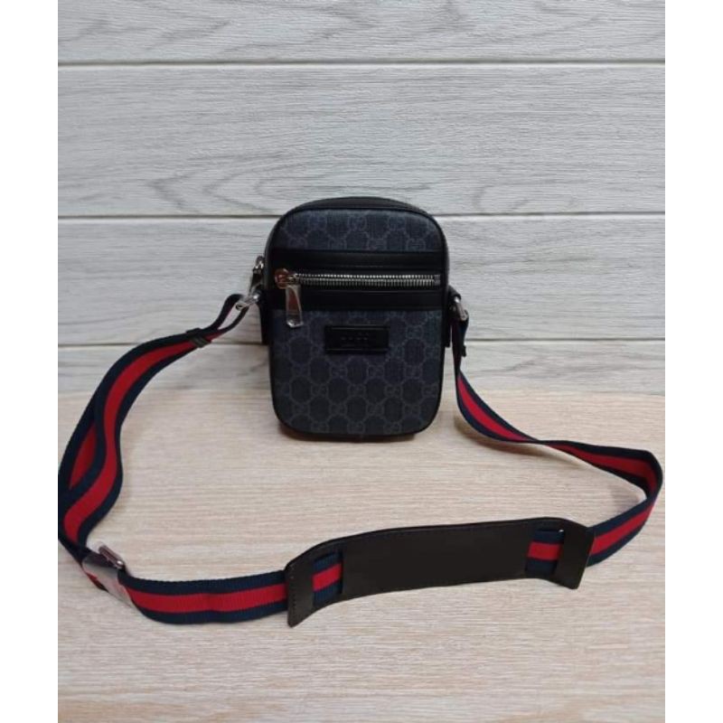 Gucci sling deals bag men