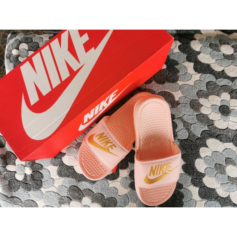 Nike slippers hotsell benassi orange