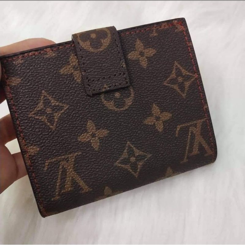 Leather wallet Louis Vuitton Brown in Leather - 31582072