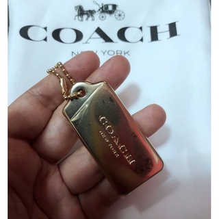 Coach gold cheap metal hang tag