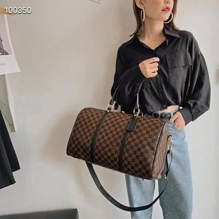 Lv hand best sale carry luggage