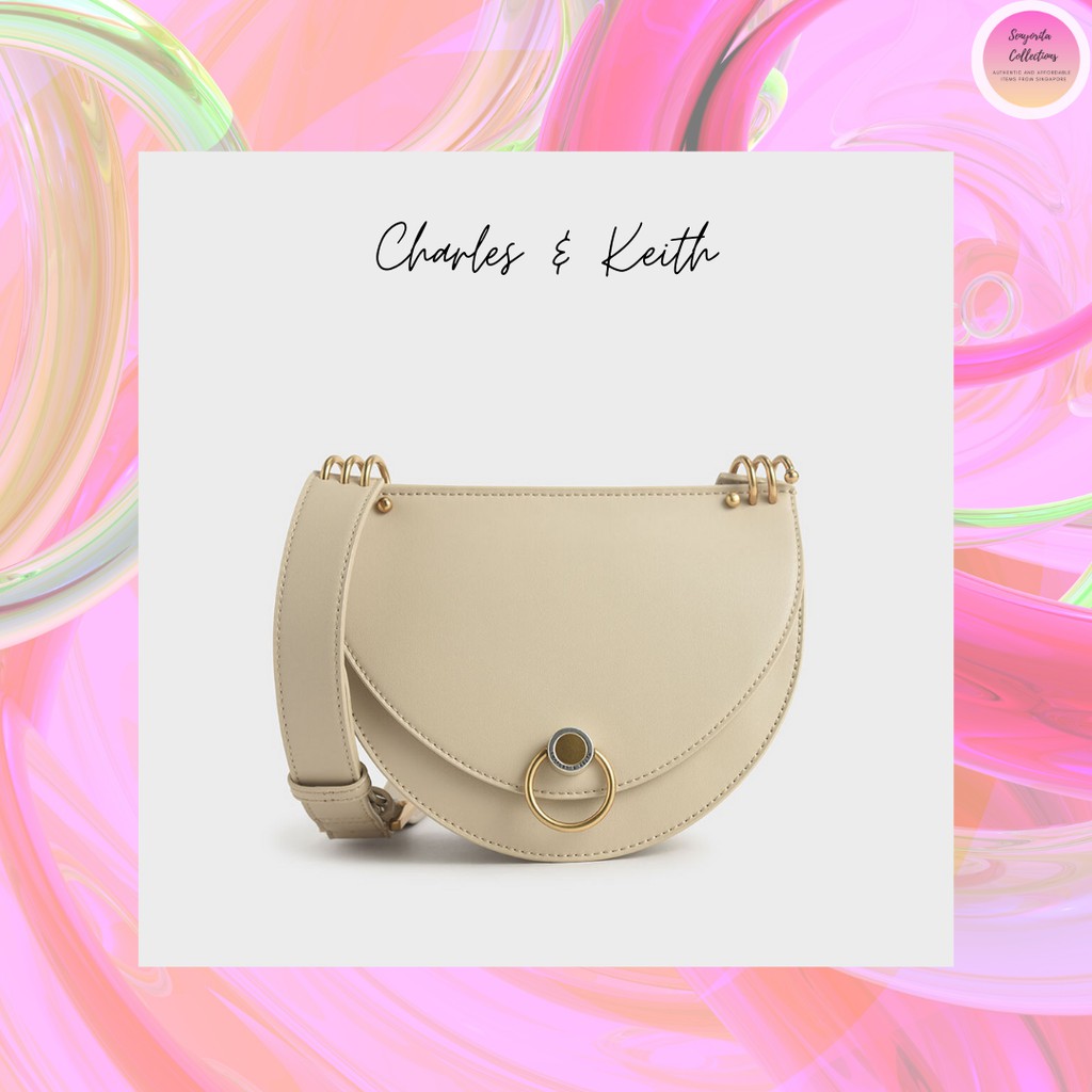 Charles and Keith Ring Push Lock Saddle Bag (Ivory) Shopee Philippines