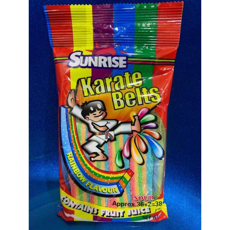 sour belt sunrise karate belt chewy candy cola , jungle string
