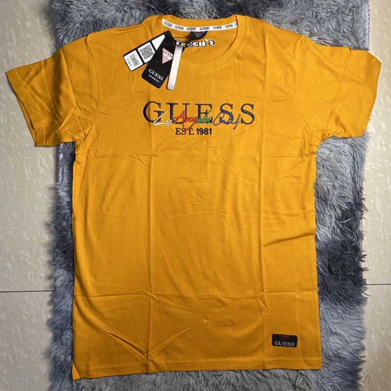 Guess mustard store t shirt