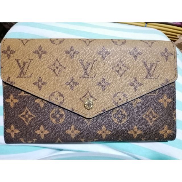 LV two tone/reverse monogram sling wallet (not authentic)