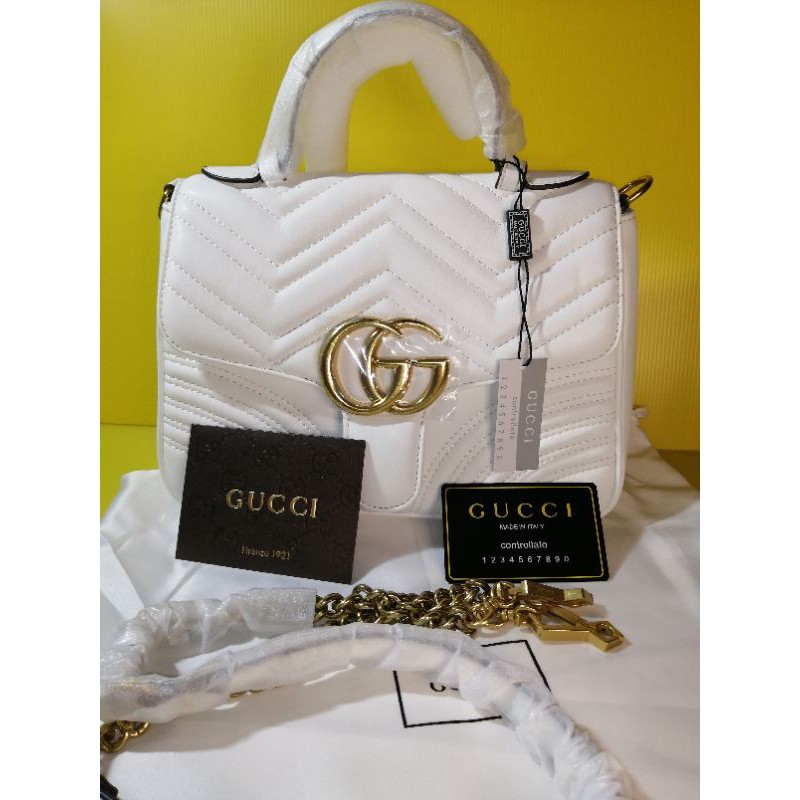 White gucci 2025 sling bag