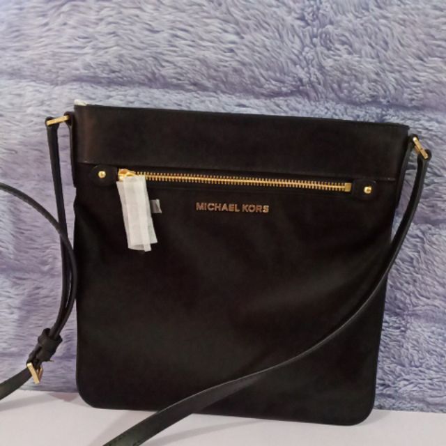 Michael kors sling on sale bag original price